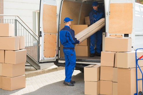 Mover handling furniture safely inside a property