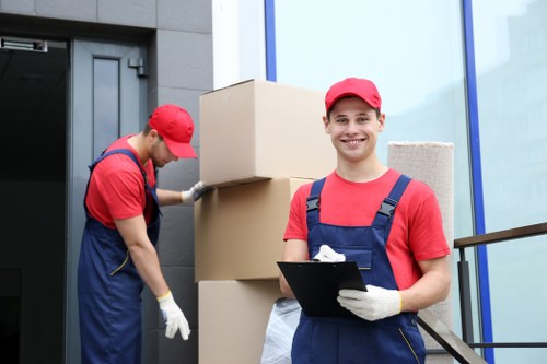Loading furniture and boxes into a moving vehicle for a Harrow home move