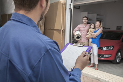 Packed boxes and furniture ready for transport in a Harrow flat move