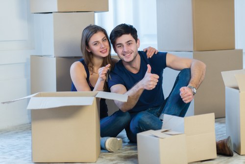Packed boxes and furniture prepared for a house move in Harrow