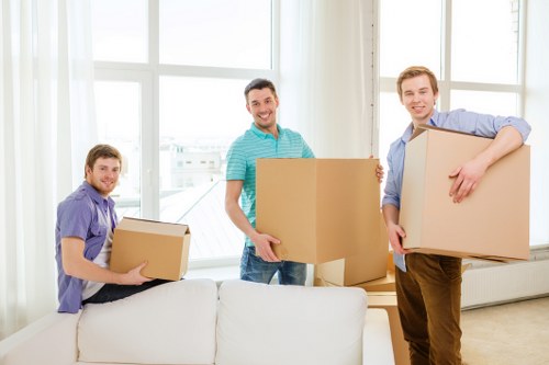 Loading furniture and boxes into a removal van in Harrow