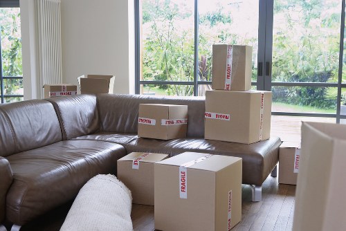 Furniture being moved through stairs and tight access in a Harrow home