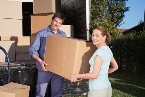 Packed household boxes and furniture ready for transport